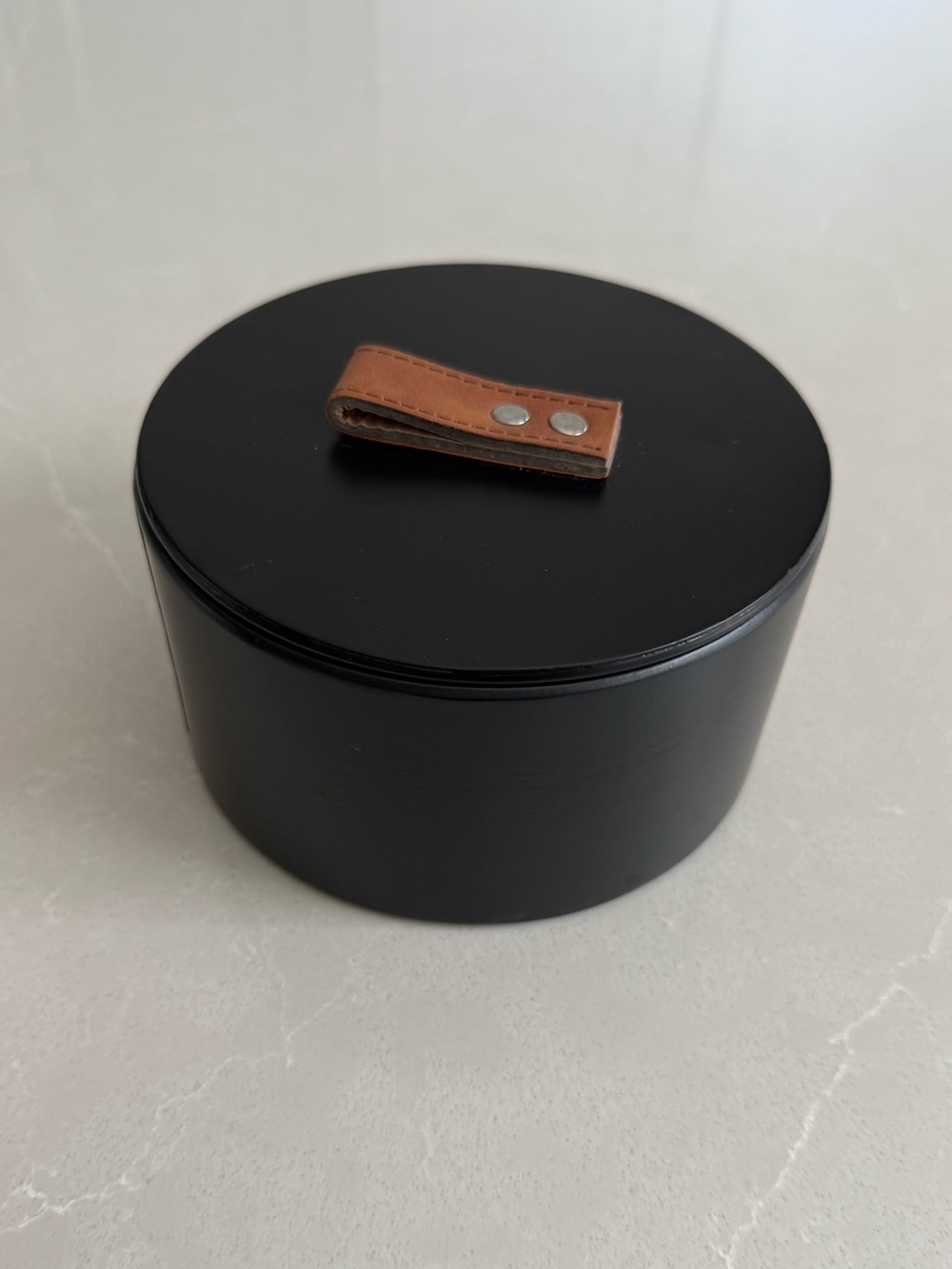 Black Round Decorative Storage Box with Brown Pull Tab